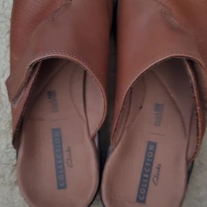 Brown Clarks leather slip ons